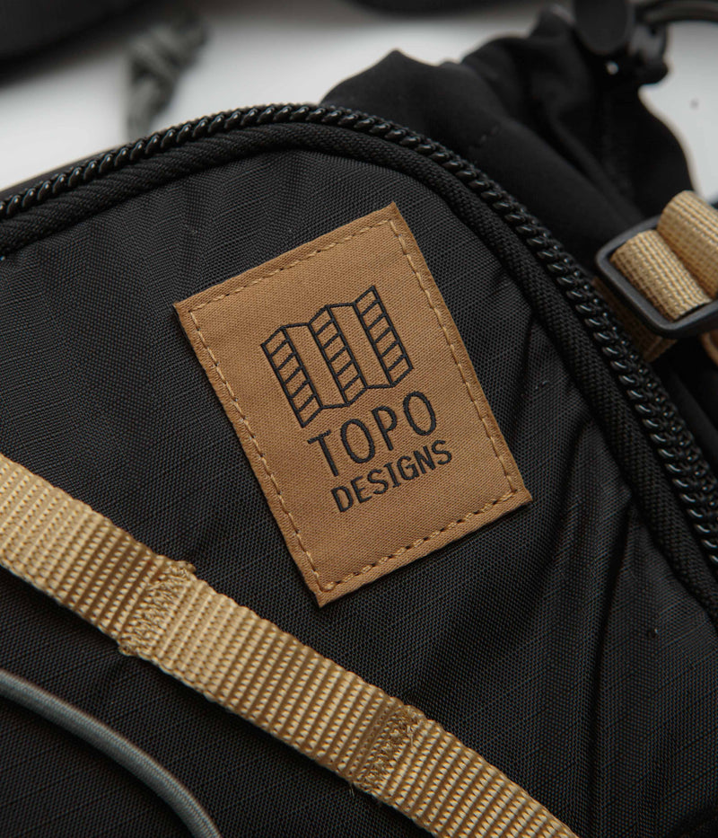 Topo Designs Mountain Hydro Hip Pack in Black and Neutral