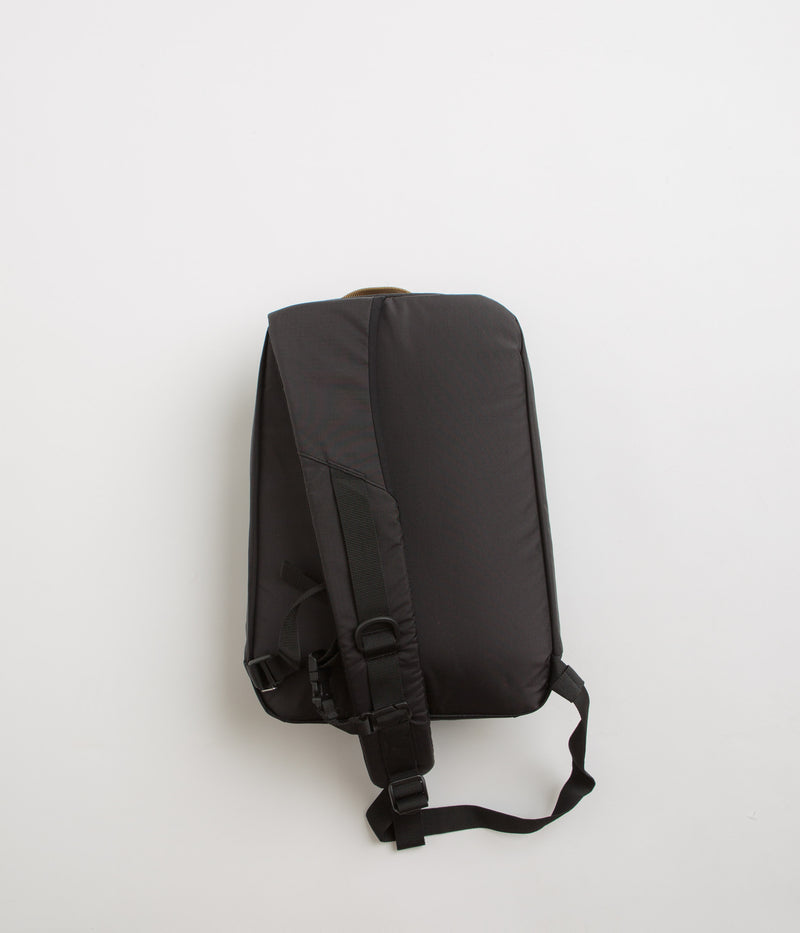 Topo Designs Mountain Sling Bag in Black and Neutral