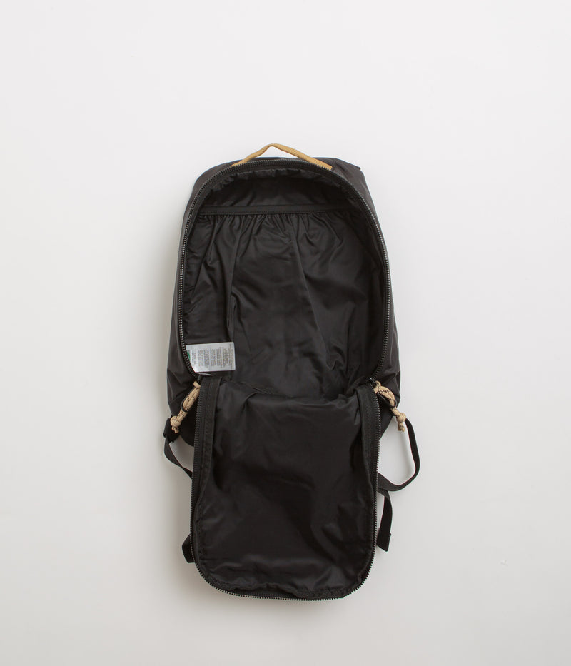 Topo Designs Mountain Sling Bag in Black and Neutral