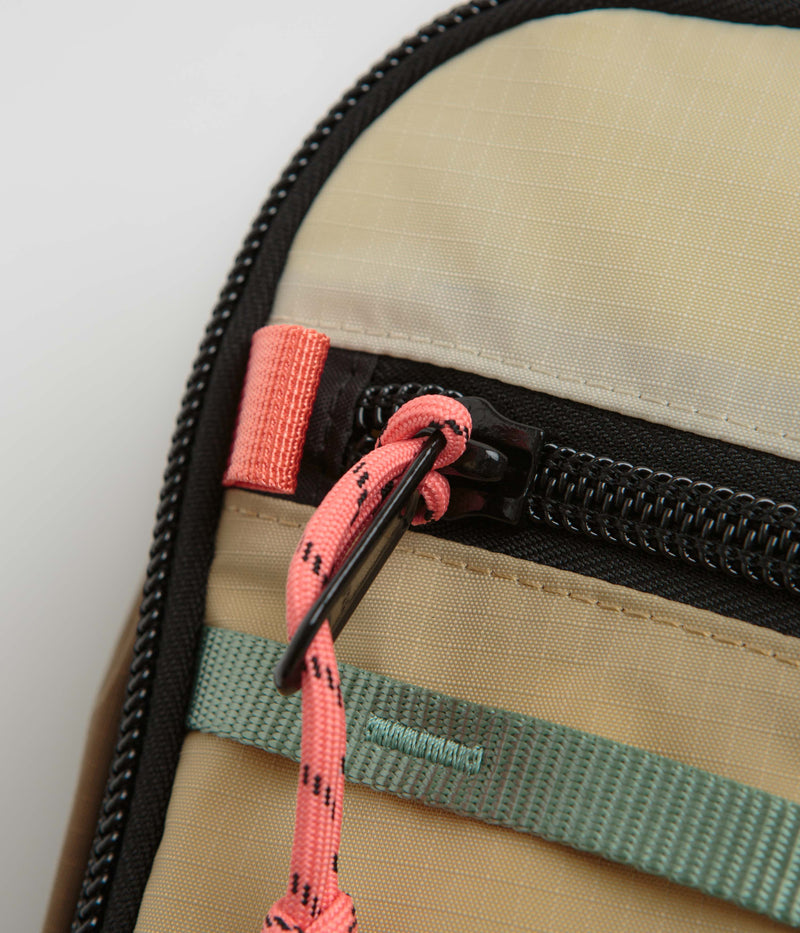 Topo Designs Mountain Sling Bag in Desert Palm and Sahara
