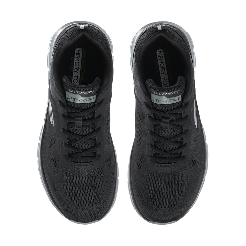 Men's wide black sneakers showing insoles with Memory Foam and Lite-Weight text