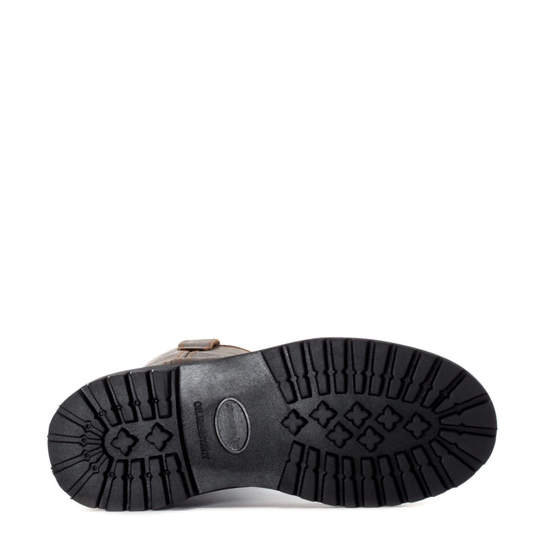 Steel-toe work boot outsole, black lug tread with oval traction insert