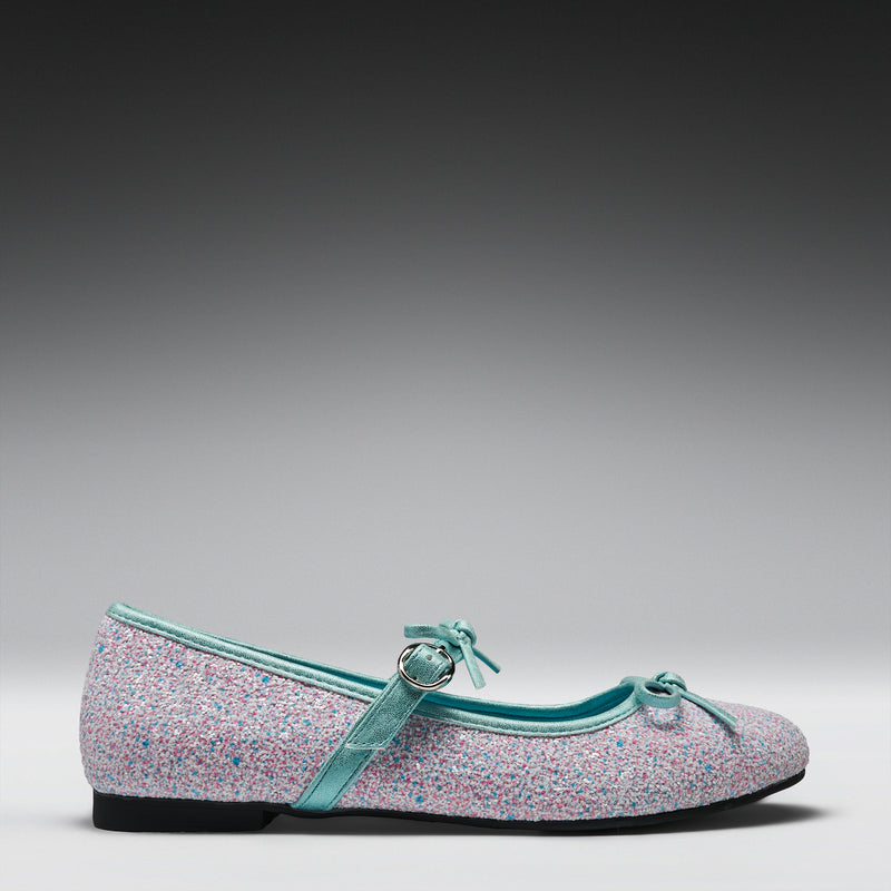 Single shoe with glittery texture and light blue strap on a gray background