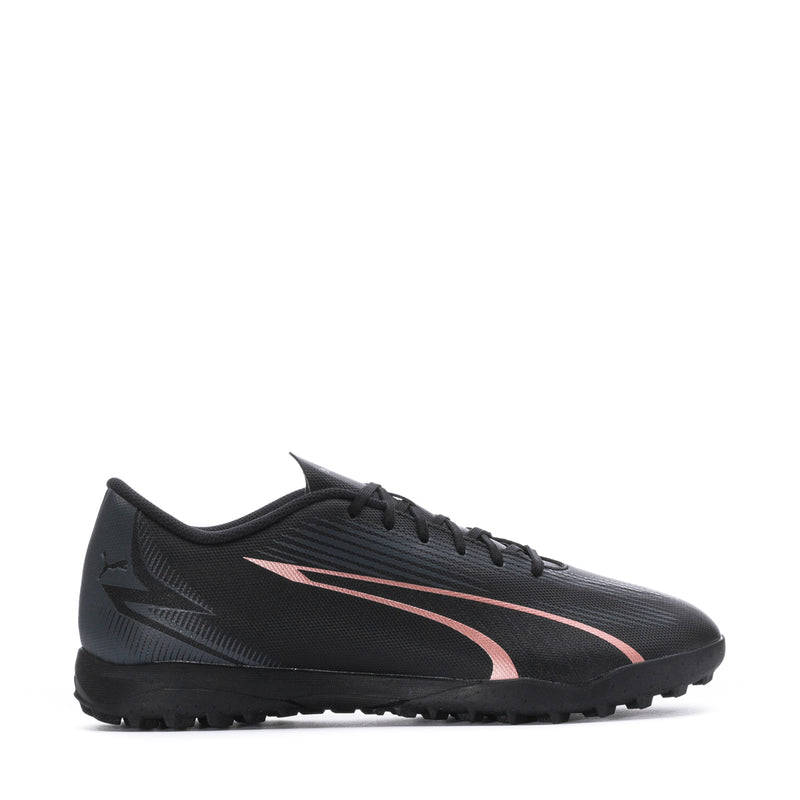 Men's Puma turf soccer shoes, black with copper-pink side stripe, lace-up.