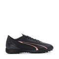 Men's Puma turf soccer shoes, black with copper-pink side stripe, lace-up.