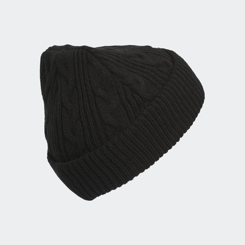 Black cable-knit beanie with cable pattern and folded top, ribbed edge.