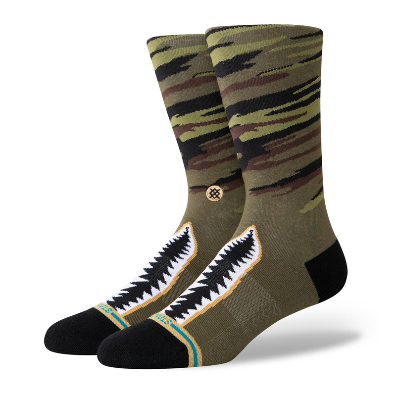 Olive camo crew socks with black toe, heel, and white zigzag front design