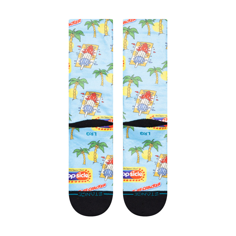 Unisex crew socks with light blue popsicle pattern and palm trees, black toe and heel