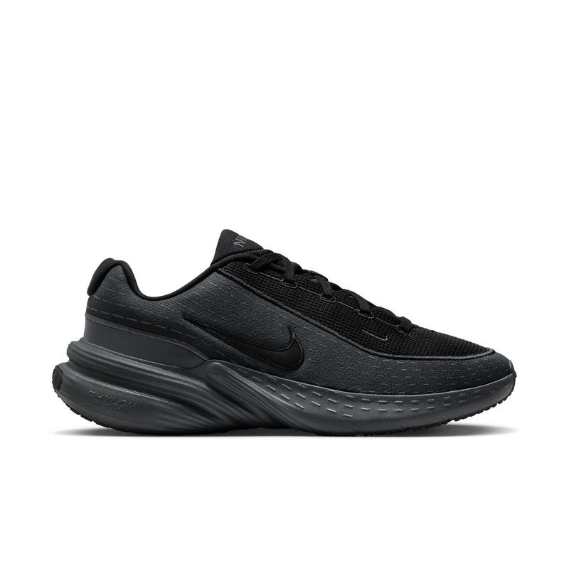 Black running sneaker with Nike Swoosh and cushioned, ridged midsole