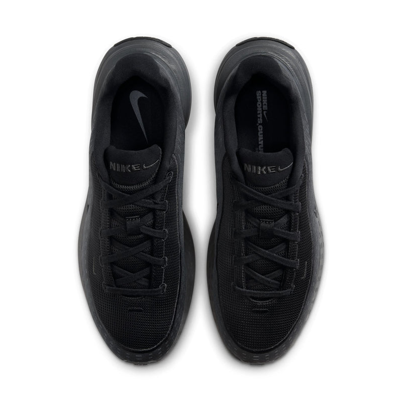 Black sneakers with lace-up mesh uppers and rounded toe, viewed from above