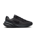 Women's black knit running shoes with lace-up, Nike swoosh, and cushioned midsole