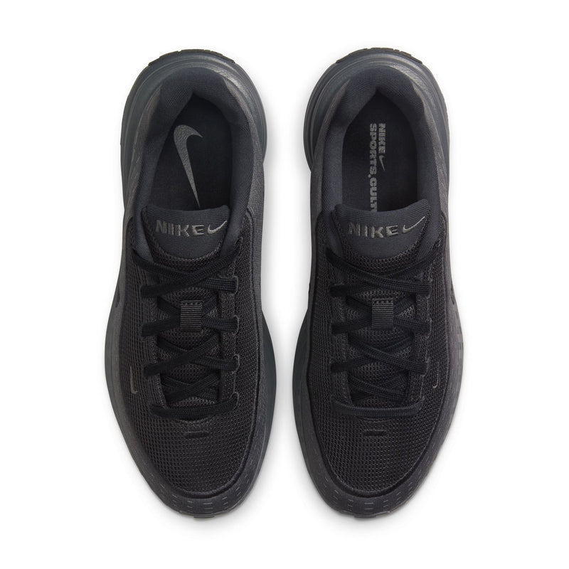 Women's black lace-up sneakers, top view showing mesh texture and Nike on insoles