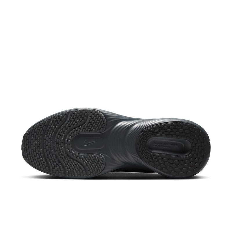 Women's black rubber outsole with textured tread pattern on forefoot and heel