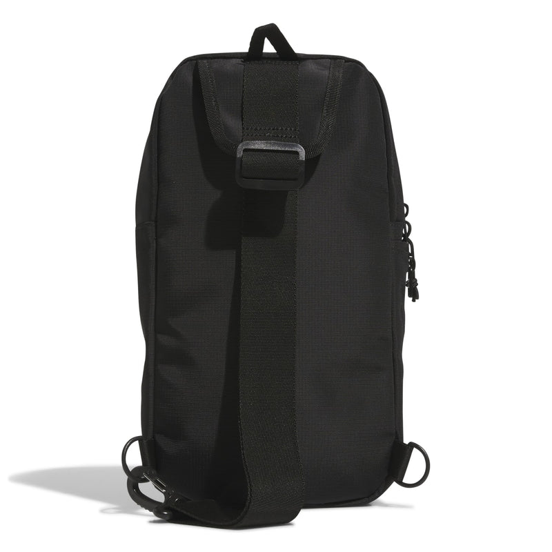 Black utility sling bag back view with top handle, buckle strap, and cinch cords