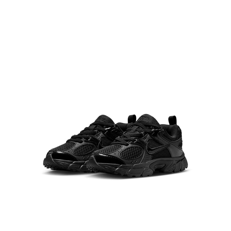 Kids black athletic running shoes, side view with Nike-style swoosh and laces
