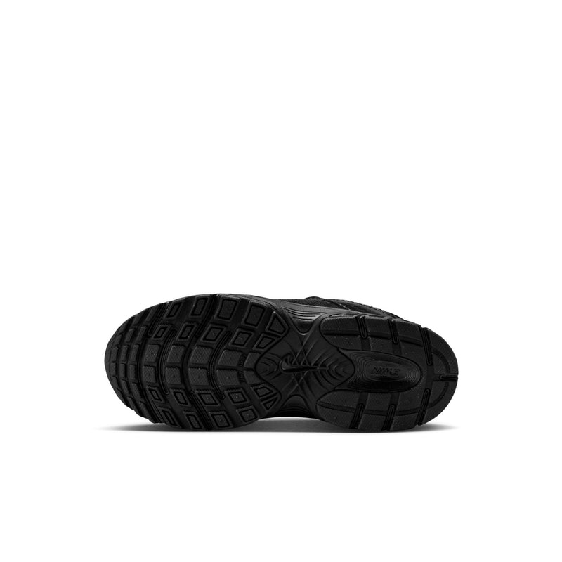 Kids black shoe outsole with tread pattern and thick rubber construction