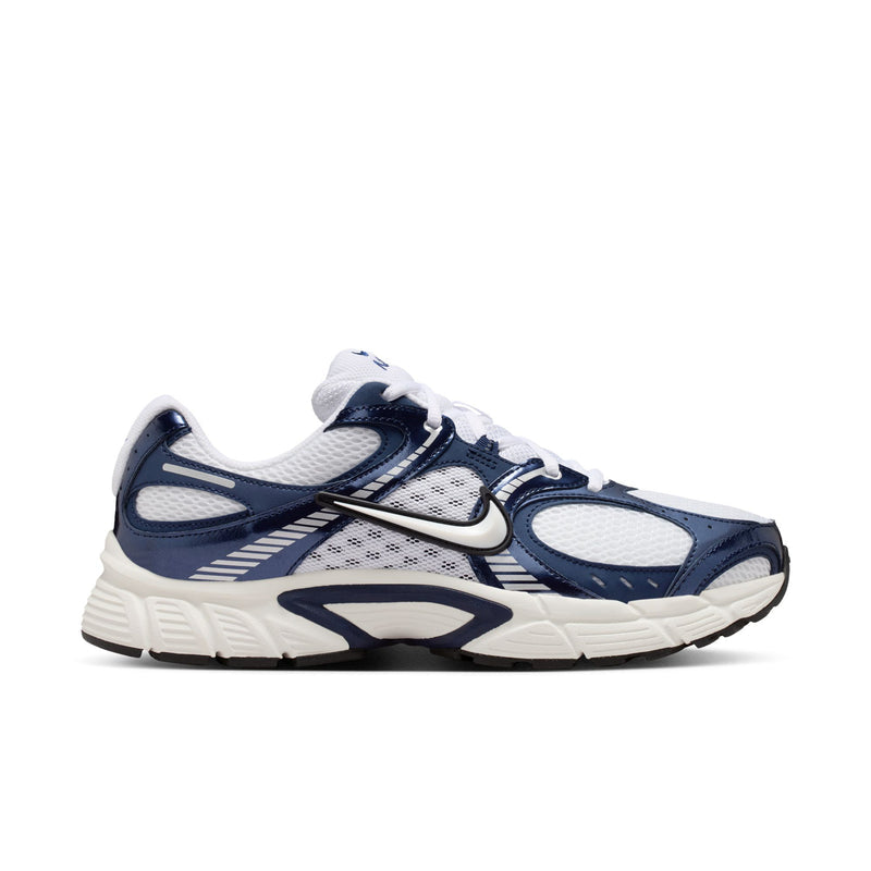 Mens running sneakers in white and midnight navy with NIKE swoosh and lace-up design