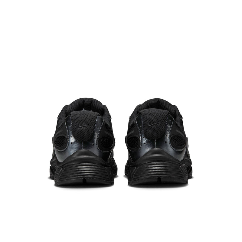 Men's black sneakers with rear pull tab and ribbed heel cushioning