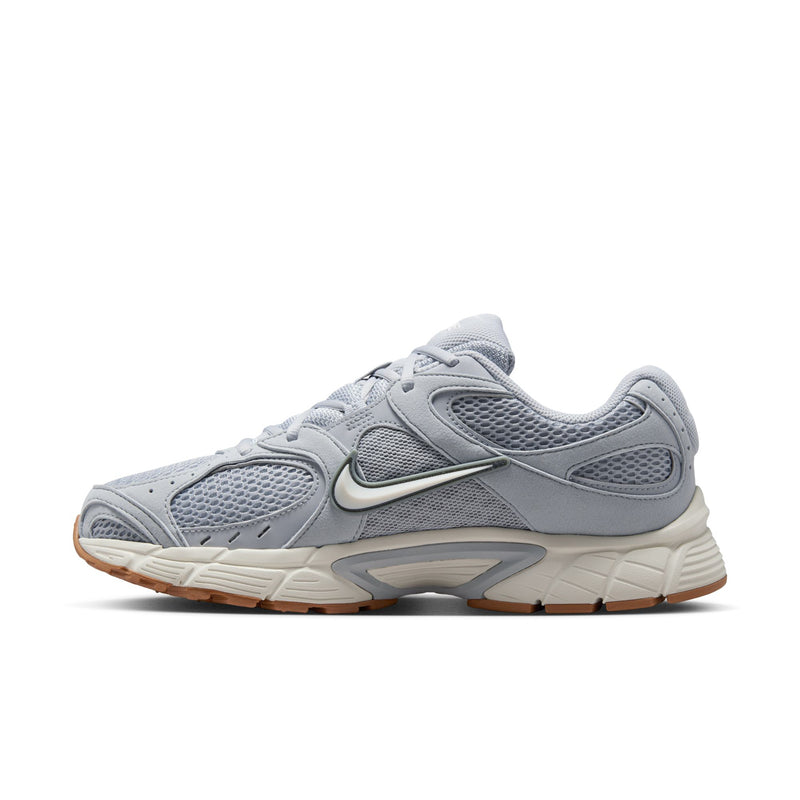 Men's light gray running shoes, opposite side view with Nike swoosh and gum outsole