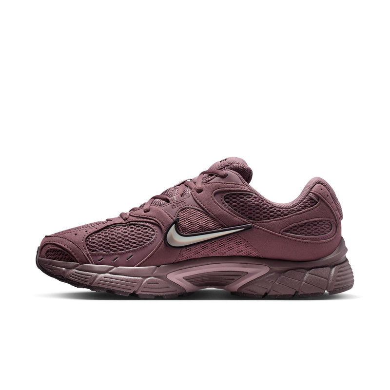 Men's athletic sneakers, dusty mauve, side profile with NIKE swoosh and ridged sole