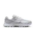 White lace-up running sneaker with mesh upper, Swoosh logo, and chunky sole