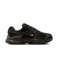 Women's black running shoe with mesh upper, lace-up, and rubber outsole tread