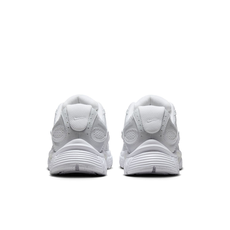 White running sneakers from the back with heel tabs and Swoosh logo details
