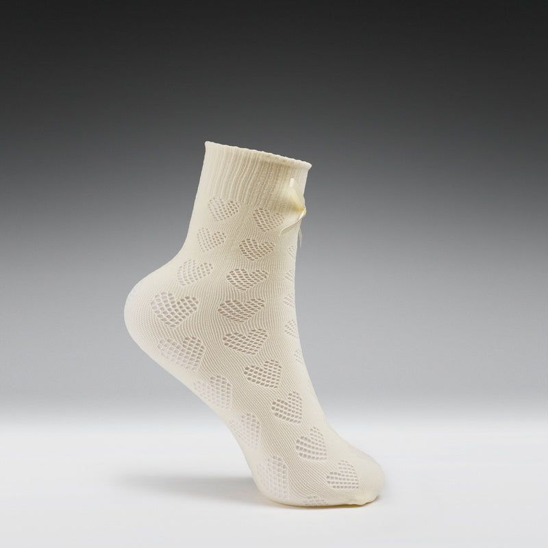 White sock with a subtle pattern on a gray background