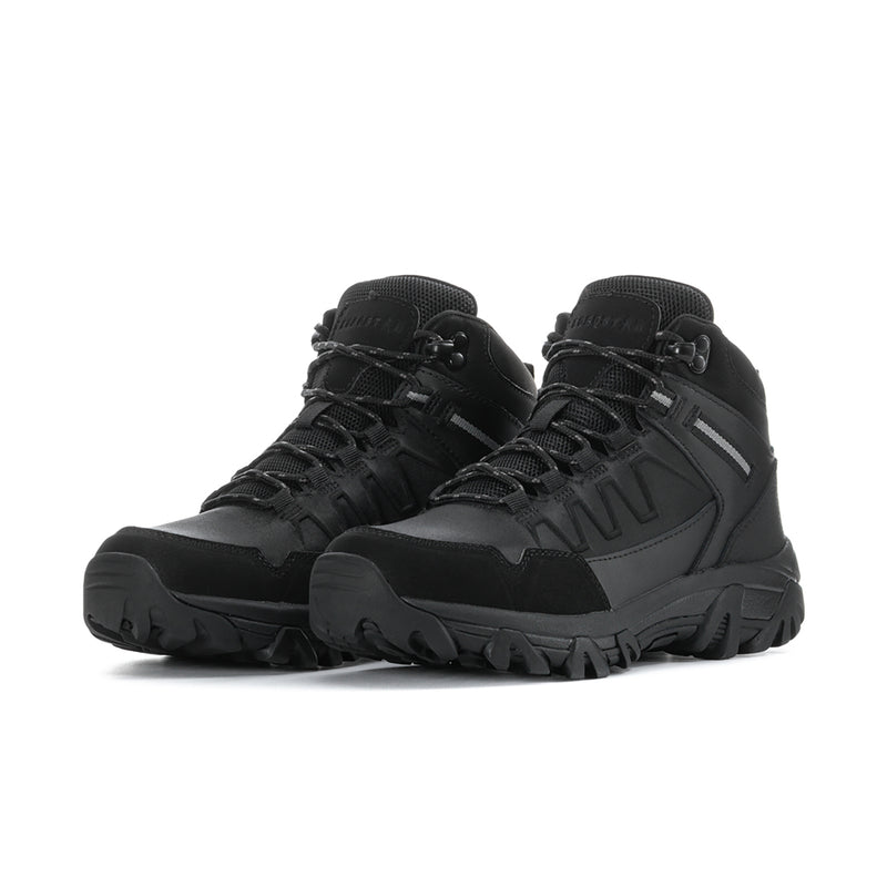 Men's black lace-up mid-top boots, rugged paneling and chunky tread sole