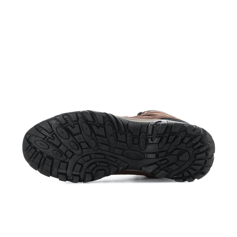 Outsole view of men’s brown hiking boots with textured traction rubber tread