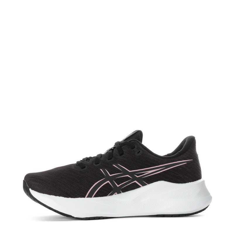 Women's black running shoe, side view, pink logo stripes and white midsole
