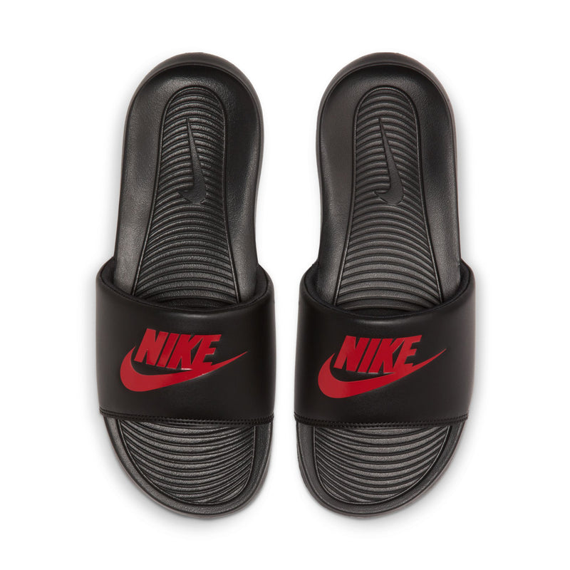 Pair of men's black Nike slide sandals with red Nike wordmark on straps