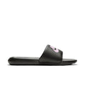 Women's black slide sandals with light pink Nike logo on the strap