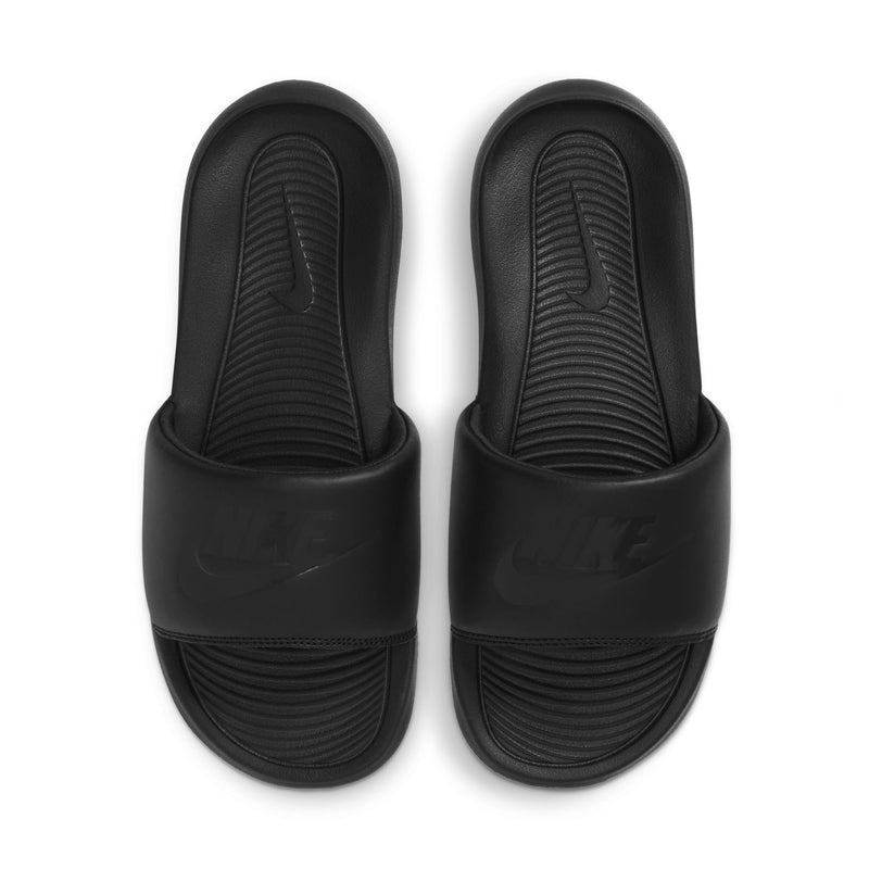 Pair of black slide sandals with rounded toe and cushioned strap over foot.