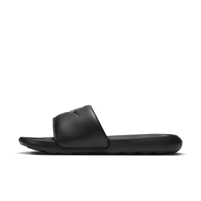 Black slide sandal with padded strap and textured outsole tread.