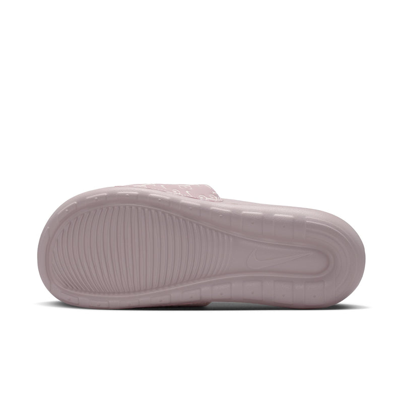 Mauve-pink slide sandals outsole view with molded traction texture