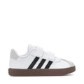 White toddler sneakers with hook-and-loop strap, black stripes and brown rubber sole