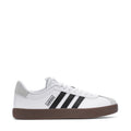 VL Court 3.0 women's sneakers in white with black stripes and gum-brown sole.