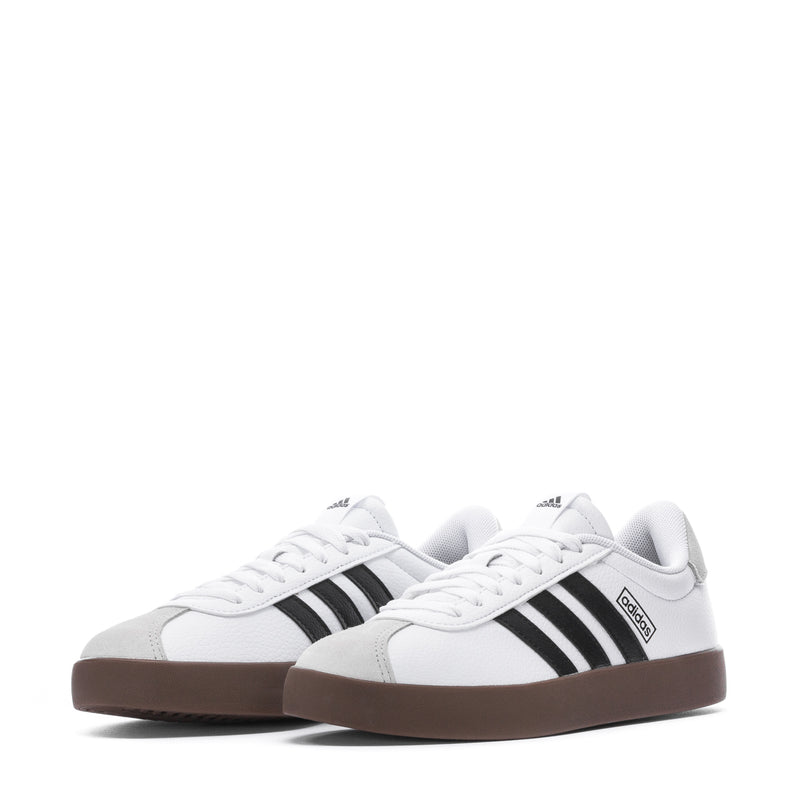 VL Court 3.0 women's sneakers, white with black triple stripes and gum-brown outsole.