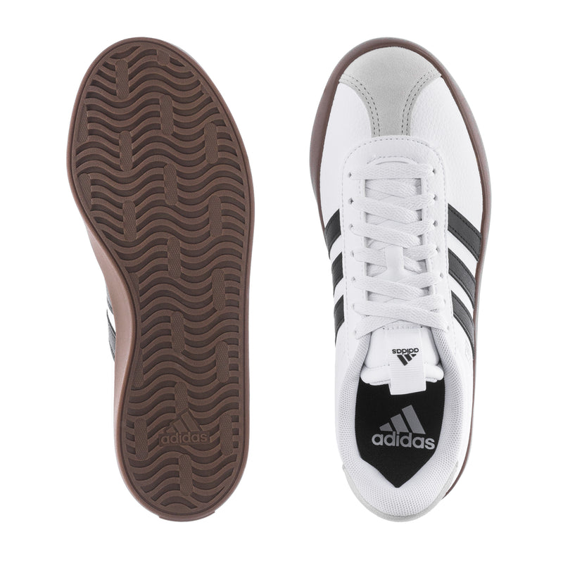 VL Court 3.0 women's sneakers: white uppers, black stripes, and brown tread outsole.