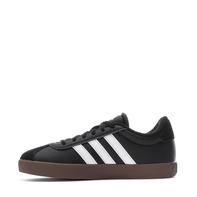 Black youth court sneaker, side profile with three white stripes and lace-up
