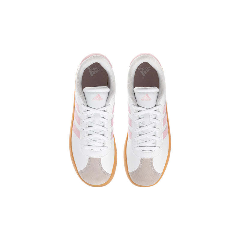 Pair of youth white sneakers with pink accents and lace-up front