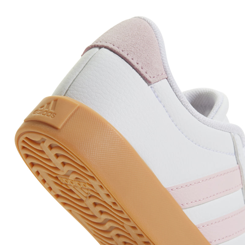 Youth sneaker outsole with adidas logo and tan rubber traction tread
