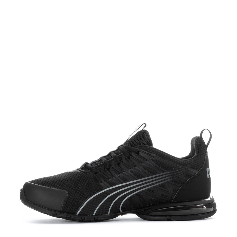 Youth black Puma sneakers, mesh upper with gray stripes and padded heel collar