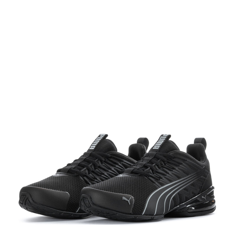 Youth black Puma sneakers pair view with gray graphics and lace-up forefoot