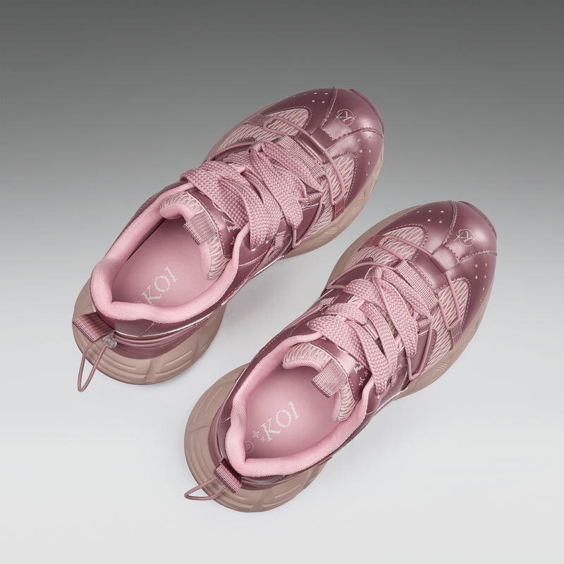Pair of pink sneakers with a brand logo on a gradient background