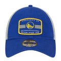 Blue trucker cap with front “Property of” patch and gold crest; adjustable strap.