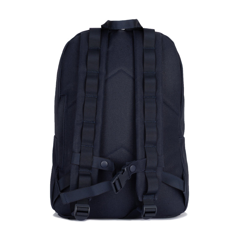 Waxed canvas day pack in navy, padded back panel and adjustable shoulder straps