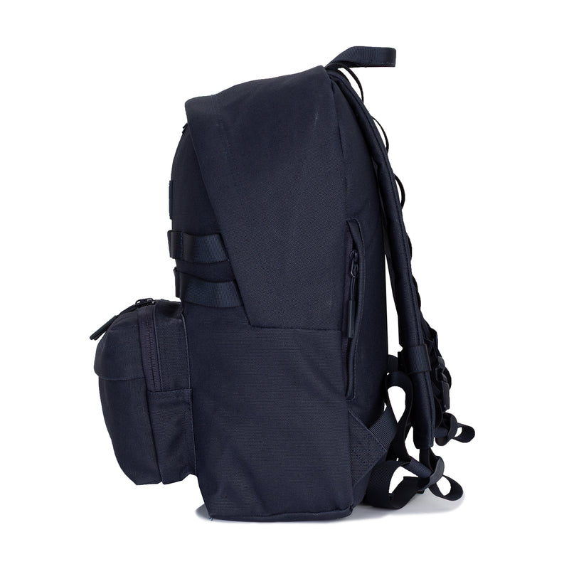 Waxed canvas day pack in navy, side pocket and adjustable shoulder harness