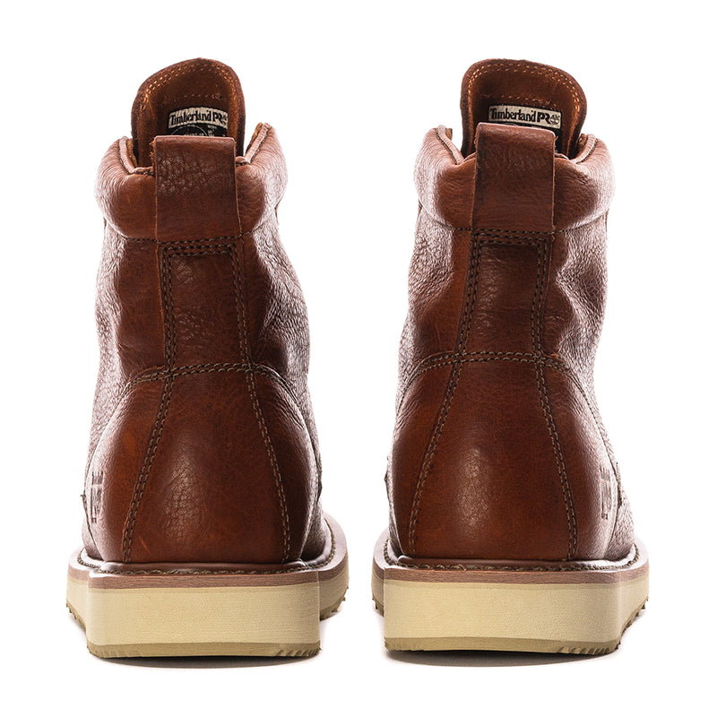 Rust brown leather lace-up wedge boots, back view with padded heel tabs